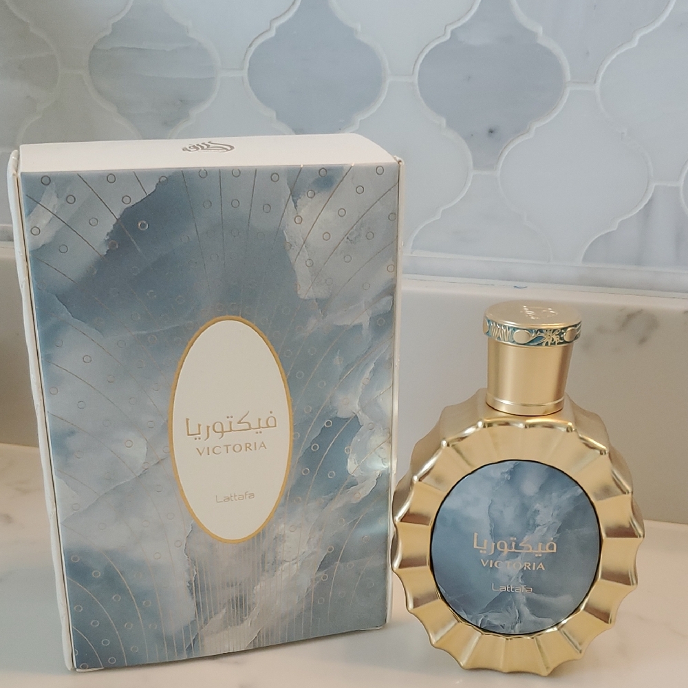 Lattafa Victoria Women’s Fragrance - Gold and Blue. Only Spray Four Times